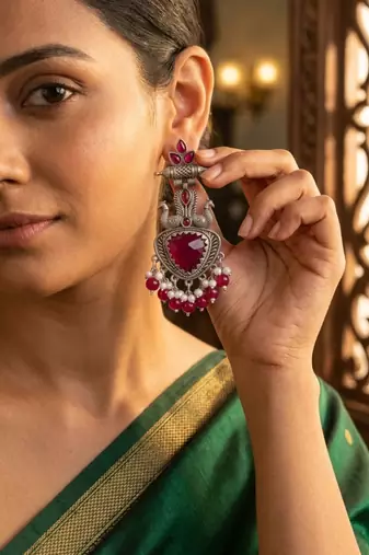 Ruby red peacock oxidised statement earrings