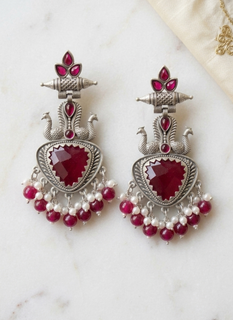 Ruby red peacock oxidised statement earrings