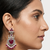 Ruby red peacock oxidised statement earrings