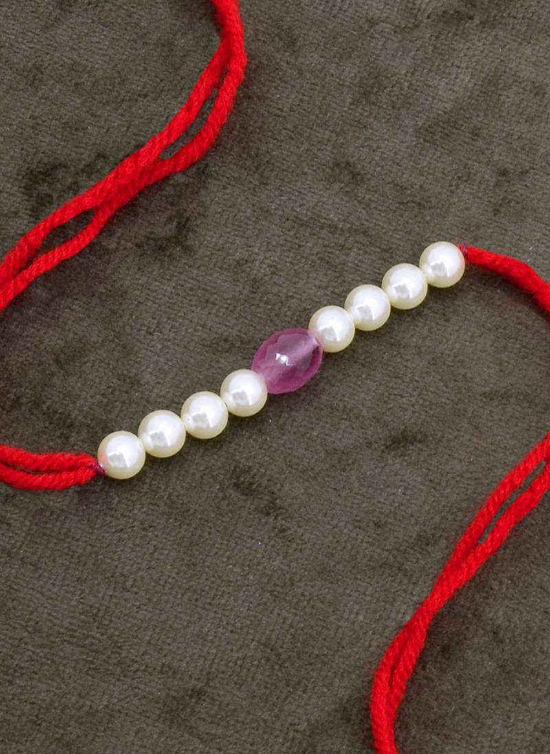 Designer pearl rakhi for brother - traditional pink bead thread