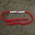 Designer pearl rakhi for brother - traditional pink bead thread