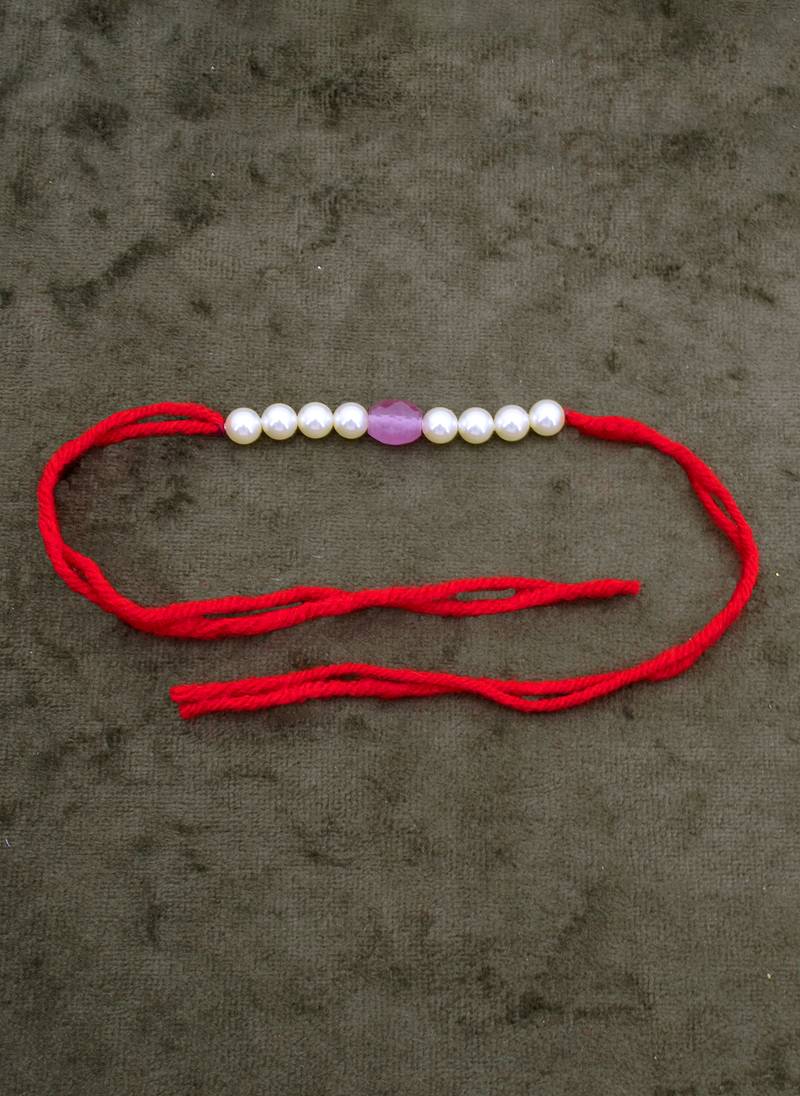 Designer pearl rakhi for brother - traditional pink bead thread