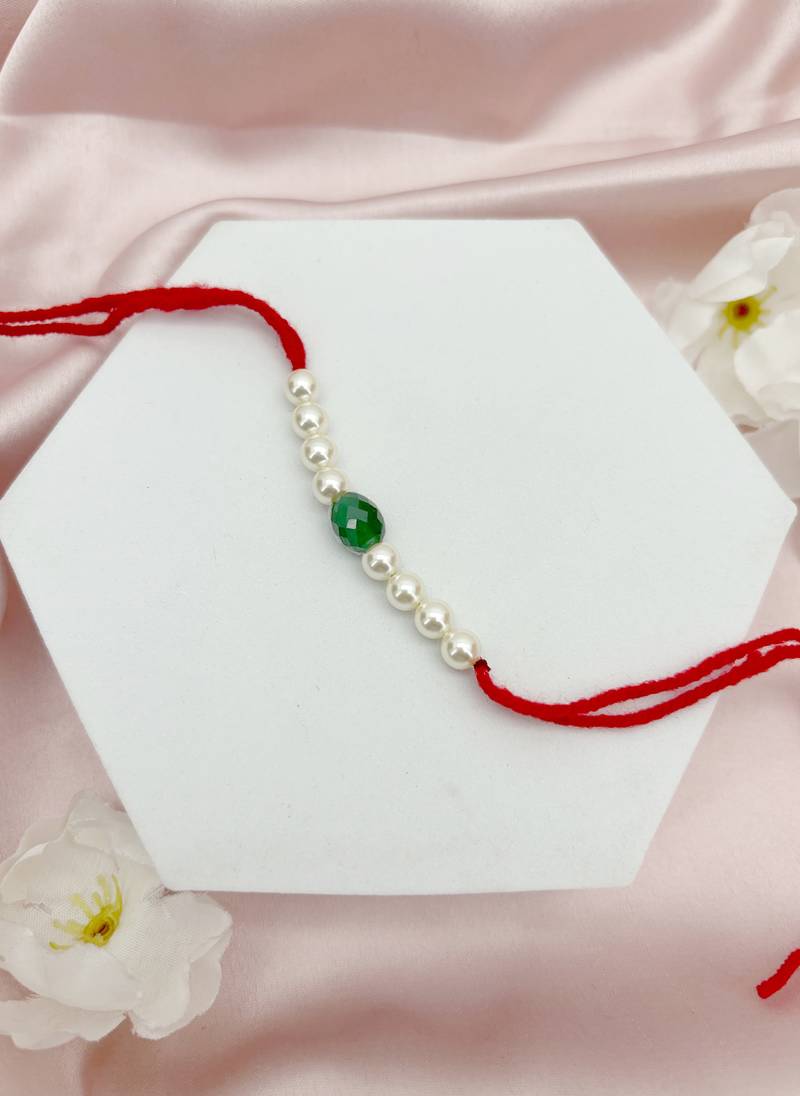 Designer pearl rakhi for brother - traditional green bead thread