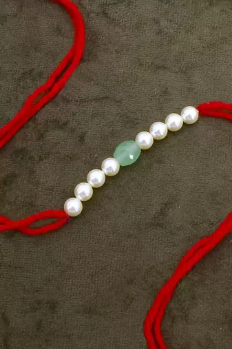 Designer pearl rakhi for brother - traditional aqua bead thread