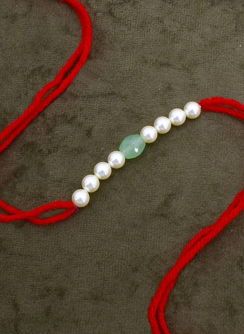 Designer pearl rakhi for brother - traditional aqua bead thread