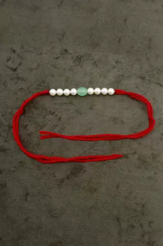 Designer pearl rakhi for brother - traditional aqua bead thread