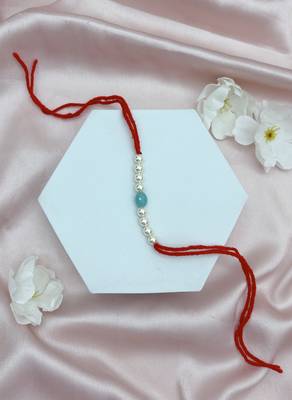 Designer pearl rakhi for brother - traditional sky blue bead thread 1