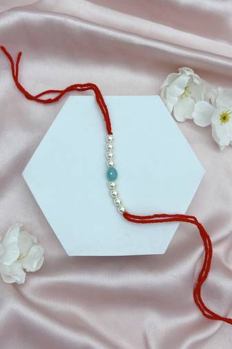 Designer pearl rakhi for brother - traditional sky blue bead thread
