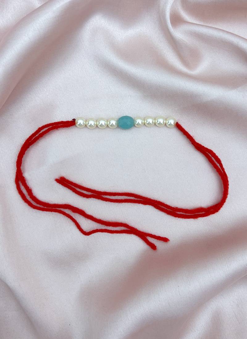 Designer pearl rakhi for brother - traditional sky blue bead thread