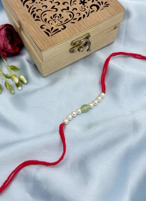 Designer pearl rakhi for brother - traditional mint bead thread 1