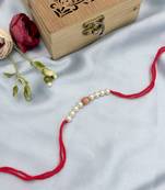 Designer pearl rakhi for brother - traditional peach bead thread