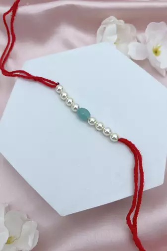 Designer pearl set of 3 rakhi for brother - traditional bead thread