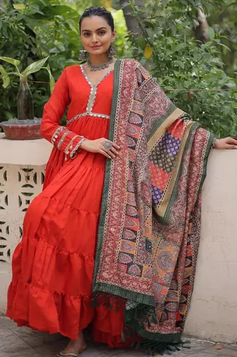 Orange roamn silk free size stitched anarkali suit with mirror lace work