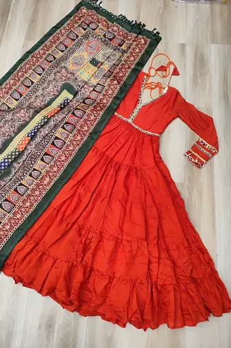 Orange roamn silk free size stitched anarkali suit with mirror lace work