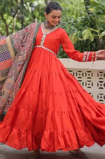 Orange roamn silk free size stitched anarkali suit with mirror lace work