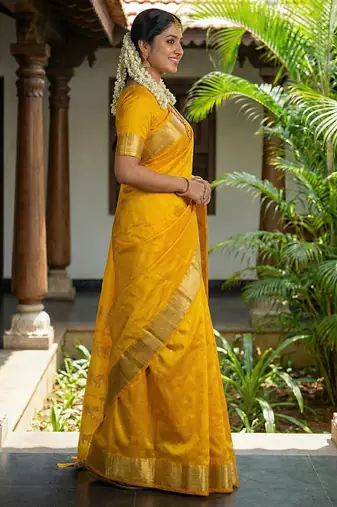 Gold color onam special saree