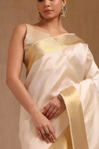 Cream color onam special saree