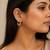 Gold quilted puffed hoop earrings