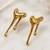 Metallic gold molten drip sculptural stud earrings