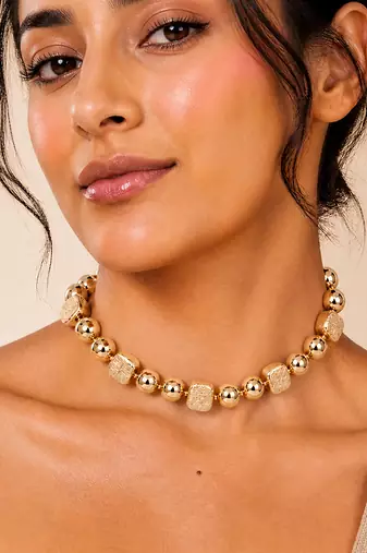Gold plated bead statement necklace