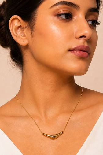 Metallic gold varka crescent pendant necklace