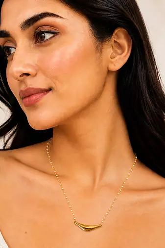 Mtallic gold curved bar pendant pearl rosary necklace