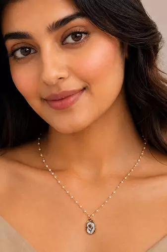 Gold chaand oval shell pendant necklace