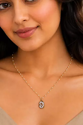 Gold chaand oval shell pendant necklace