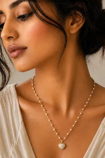 Gold bead chain heart necklace