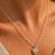 Gold bead chain heart necklace