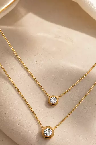 Gold double chain ball pendant necklace