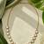 Gold crystal stones tennis necklace