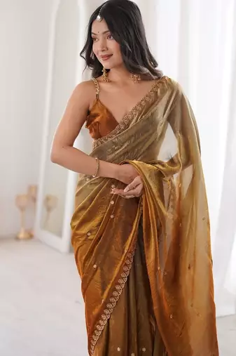 Gold colour fendy satin sequins embroidered saree with unstitched blouse