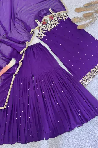 Purple colour faux georgette embroidered sharara suit with dupatta