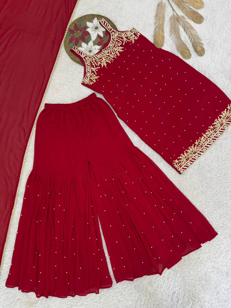 Red colour faux georgette embroidered sharara suit with dupatta