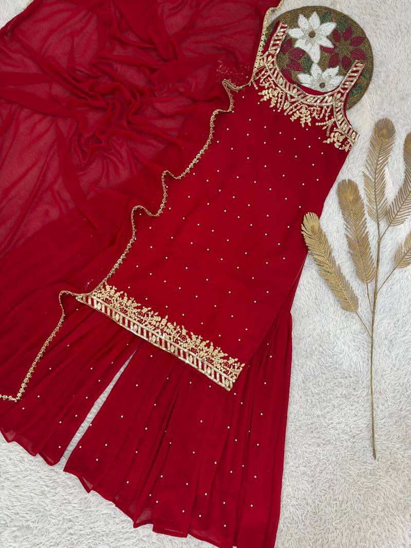Red colour faux georgette embroidered sharara suit with dupatta