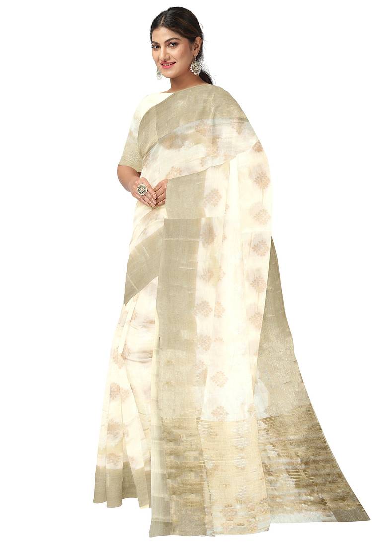 Cream oof white zari woven designer saree