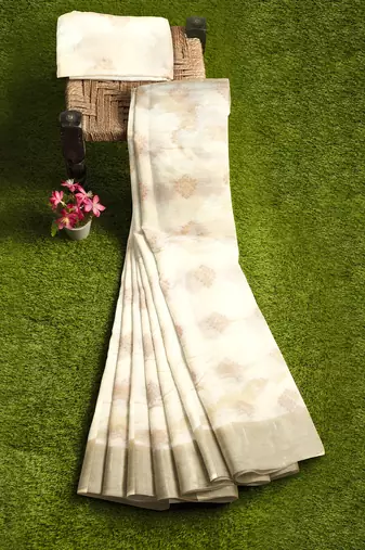 Cream oof white zari woven designer saree