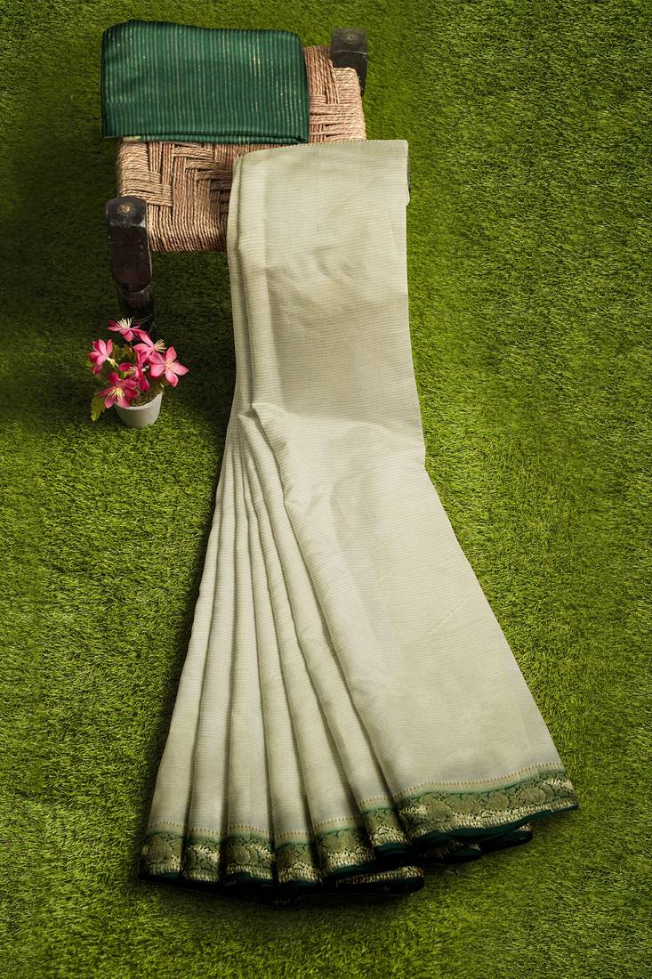 Cream & dark green zari border saree