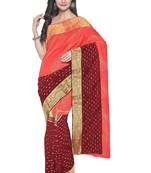 Coral pink & maroon zari saree