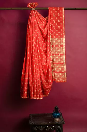 Bright red floral zari saree