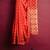 Bright red floral zari saree