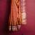 Rust orange zari border saree
