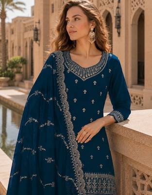 Teal faux georgette suit with embroidery work 2