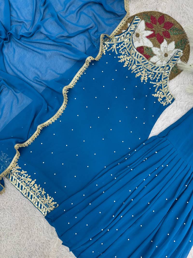 Blue colour faux georgette embroidered sharara suit with dupatta