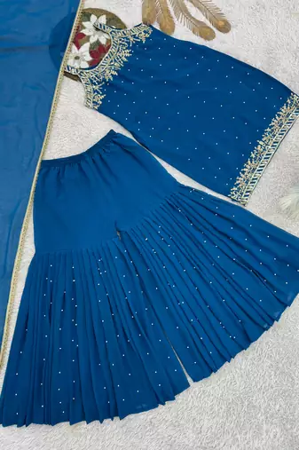 Blue faux georgette embroidered sharara suit with dupatta