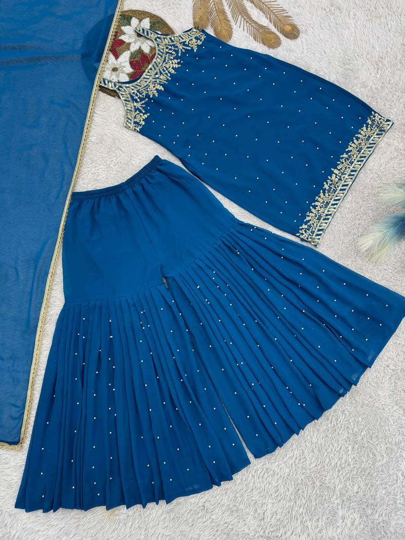Blue colour faux georgette embroidered sharara suit with dupatta