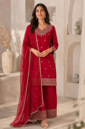 Festive red silk party wear kurti pant set with elegant zari work