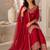 Festive red silk party wear kurti pant set with elegant zari work