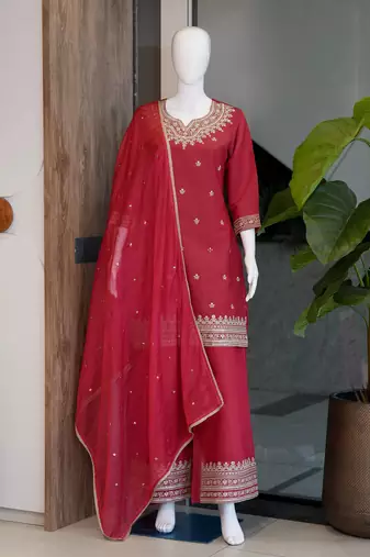 Festive red silk party wear kurti pant set with elegant zari work